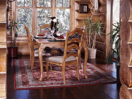 Dining area with ornately decorated table.