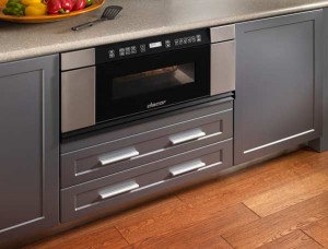 Pullout bottom freezer drawers allow greater accessibility than top freezers and require less bending over to grab items. Full-length handles make opening and closing doors a cinch. Photo: GE Pullout bottom freezer drawers allow greater accessibility than top freezers and require less bending over to grab items. Full-length handles make opening and closing doors a cinch. Photo: GE