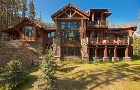 The side of the house that takes in the views is virtually a wall of glass, connecting the interiors with the outdoors. There are also several patios and decks for the homeowners to entertain friends.